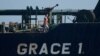 Crew members of Iranian supertanker Grace 1 walk on board off the coast of Gibraltar, August 15, 2019