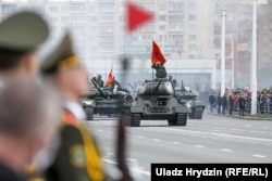 A military parade marking the 75th anniversary of the end of World War II rolls through Minsk, Belarus, on May 9. The large-scale event took place in spite of the COVID-19 pandemic. (Uladz Hrydzin, RFE/RL)