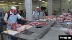Armenia - Workers at a meat-processing plant in Yerevan, 10Apr2012.