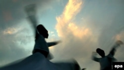 Two whirling dervishes perform during a spectacle in Istanbul in 2007 to mark the 800th anniversary of Rumi's birth.