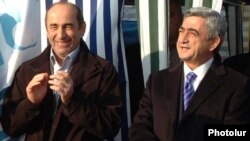 Amenia -- Armenian President Serzh Sarkisian (R) and his predecessor Robert Kocharian.