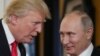 U.S. President Donald Trump (left) speaks with Russian President Vladimir Putin on the sidelines of an econmomic summit in Vietnam last month. 