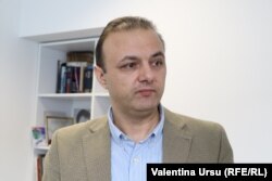 Ion Manole în vizită la Europa Liberă