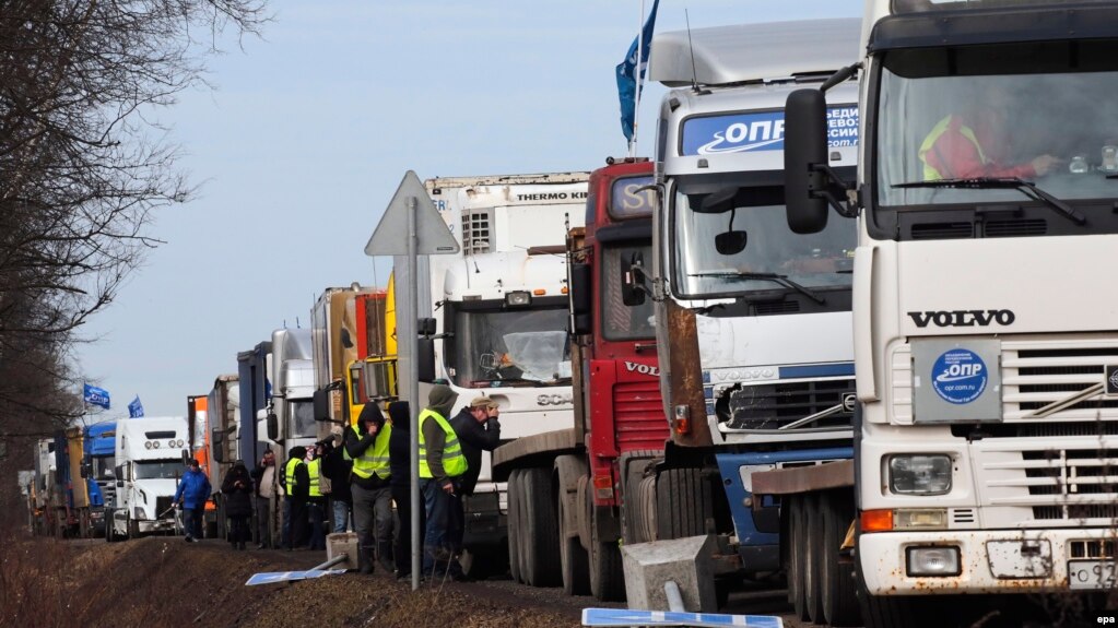 Truck drivers take part in a protest against the Platon taxation system in St. Petersburg on March 27.