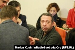 Hennadiy Korban at his trial in Kyiv on December 28. Ukrainian authorities say the influential businessman and UKROP party leader is suspected of involvement in organized crime.
