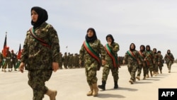 FILE: Afghan female soldiers march in the western city of Herat in April 2014.