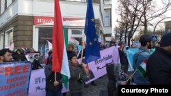 Tajik opposition activists rally in Berlin on December 10. 