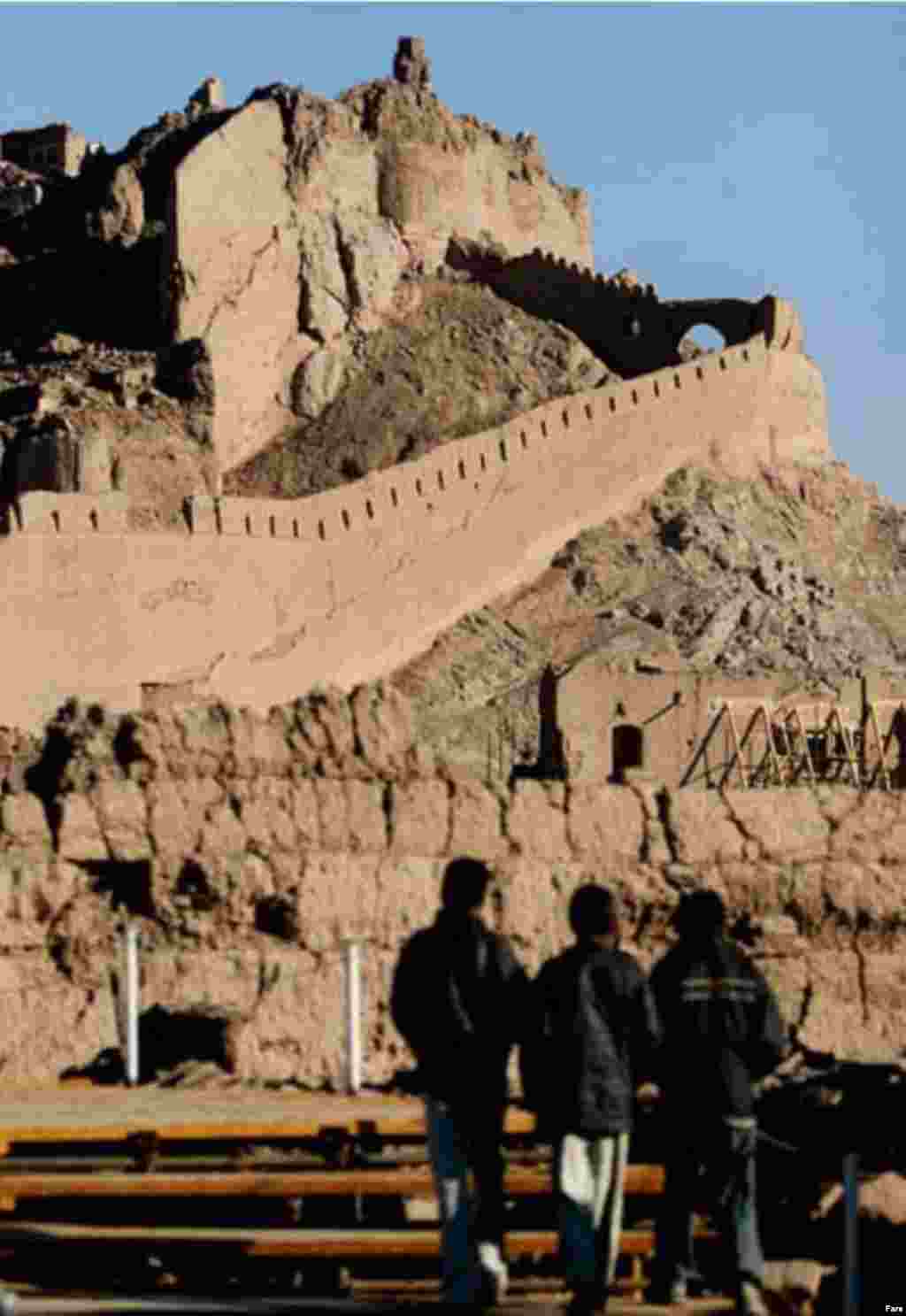 Tourists visting the Bam complex after the 2003 earthquake (Fars) - After the turn of the 20th century, the Bam citadel was used as a military barracks. However, the government abandoned it in 1932. 