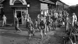 U.S. soldiers arriving in Korea on July 1, 1950.