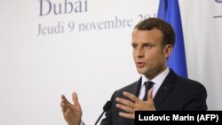 French President Emmanuel Macron gives a press conference in Dubai, November 9, 2017