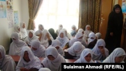 A gathering of recruits at a new Afghan women's association training center in Kabul in May.