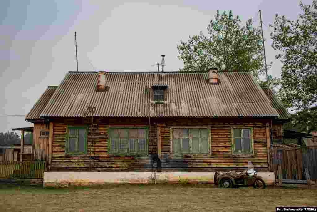 The main building of Khuzhir Airport, on Olkhon Island. The left half is the passenger waiting area, the right is reserved for Prokopyev&#39;s living quarters.
