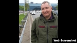 Dmitry Rogozin's taunting tweet shows him outside Moscow's Domodedovo airport.