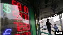 A board shows currency exchange rates in Moscow on December 15.