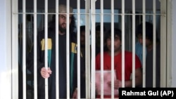 Taliban prisoners are seen inside the Pul-e Charkhi jail in Kabul.