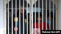 Taliban prisoners are seen inside the Pul-e Charkhi jail in Kabul.
