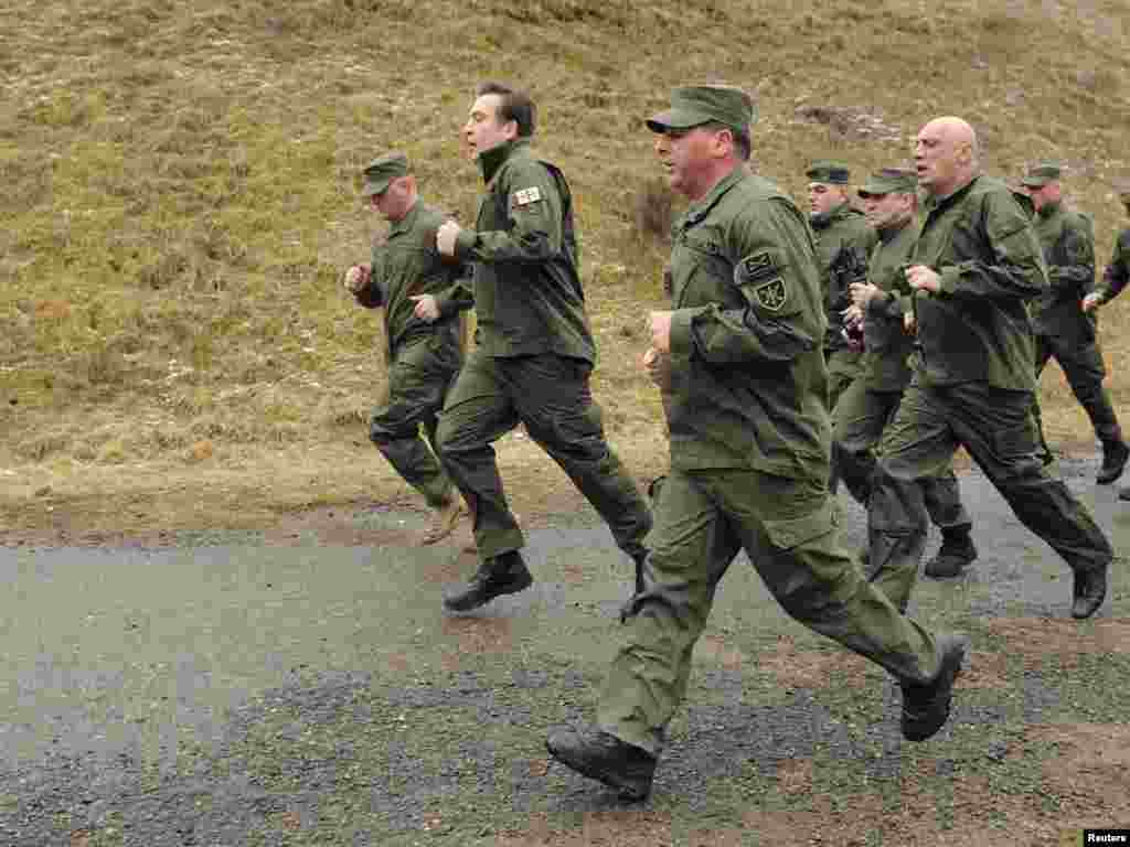Georgian President Mikhail Saakashvili (center) trains with special forces troops outside Tblisi on March 2. Presidential Press Service/Handout provided by Reuters