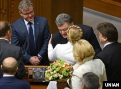Заклятые друзья: Петр Порошенко и Юлия Тимошенко в Верховной Раде Украины, ноябрь 2014 года