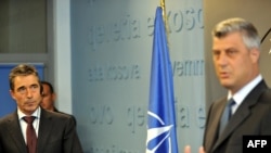 NATO Secretary-General Anders Fogh Rasmussen (left) and Kosovo Prime Minister Hashim Thaci at a joint press conference in Pristina on September 15