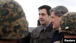 U.S. Special Envoy to Afghanistan and Pakistan Richard Holbrooke with Georgia's President Saakashvili at Krtsanisi National Military Training Center 