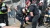Policemen detain an activist who attempted to disrupt a gay-pride march in central Kyiv on June 17. Organizers said at least 5,000 people turned up for the event. 