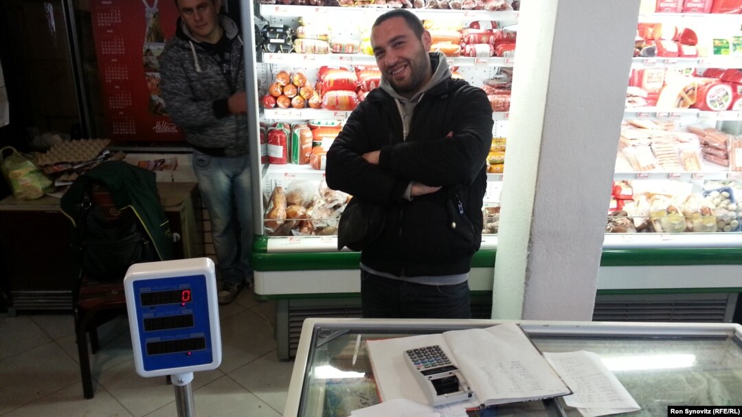 Aleksandar Josifovic, a Serb with a computer-science degree, can only find work at his father’s grocery store in Gracanica.