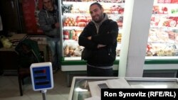 Aleksandar Josifovic, a Serb with a computer-science degree, can only find work at his father’s grocery store in Gracanica.