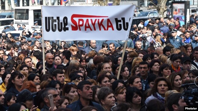 Armenia -- Employees of the Spayka company protest outside a court in Yerevan against the arrest of its chief executive, Davit Ghazarian, April 8, 2019.