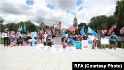 Uyghurs hold a rally in front of the White House in Washington, calling for sanctions on Chinese officials, in June 2020.