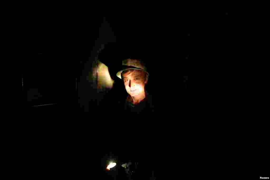 A miner descends into the copper mine.