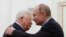 Russian President Vladimir Putin (right) embraces Palestinian leader Mahmud Abbas during a meeting at the Kremlin in Moscow in 2018.