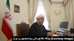 Hassan Rouhani signing a bill into law declaring all U.S. forces in the Middle East terrorists and calling the U.S. government a sponsor of terrorism. April 30, 2019