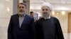 IRAN -- Iranian President Hassan Rohani (R) walks with Interior Minister Abdolreza Rahmani Fazli at the Interior Ministry in Tehran, December 21, 2015