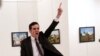 Mevlut Mert Altintas shouts after shooting Andrei Karlov, the Russian ambassador to Turkey, at an art gallery in Ankara, Turkey, December 19, 2016.<br />
<br />
The winning World Press Photo Of The Year, from Burhan Ozbilici of Associated Press, was also part of a series, &quot;An Assassination in Turkey&quot;, which won the Spot News - Stories category. Ozbilici captured the moments before and after Altintas, an off-duty policeman, drew a handgun and shot Karlov at a photo exhibition.<br />
<br />
&nbsp;