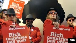 Environmental activists of the Danish organization MS ActionAid demonstrate in Copenhagen.