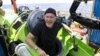 U.S. film director James Cameron emerges from the "Deepsea Challenger" sub after his solo dive in the western Pacific to the bottom of the Mariana Trench on March 26.