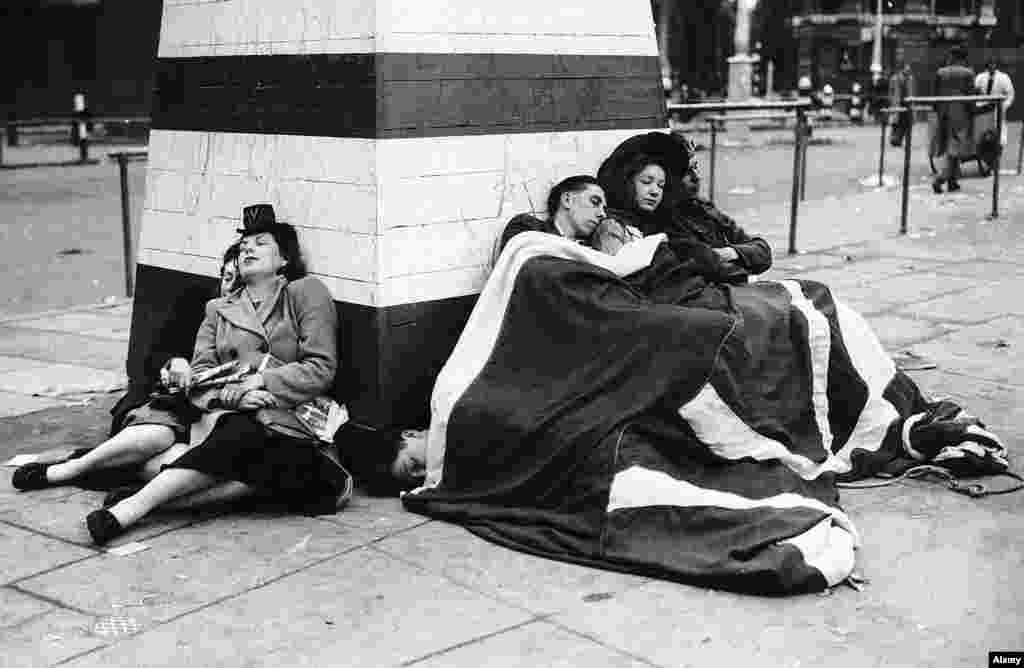 Revellers sleeping off the giant victory party. Although the war in Europe was over, the Second World War was not. The fight against Japan continued until September 1945.