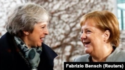 Theresa May și Angela Merkel