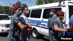 Armenia -- Police detain supporters of Prosperous Armenia Party leader Gagik Tsarukian, Yerevan, June 14, 2020.