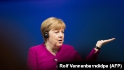 Angela Merkel la conferința cu tema „Germania într-o lume care se schimbă - cum trebuie abordate confictele și regimurile agresive”, la a 101-a Convenție Catolică din Germania, Muenster 11 mai2018