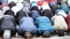 Молящиеся мусульмане