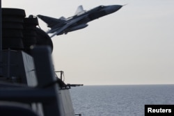 A Russian Sukhoi Su-24 attack aircraft made a close flyby to a U.S. guided-missile destroyer in the Baltic Sea last month.