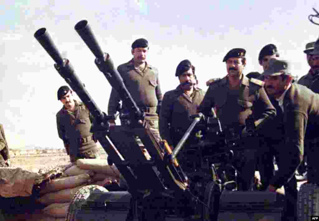 Saddam Hussein at the front during the Iran-Iraq war. Iraq invaded Iran in 1980, leading to a conflict that lasted eight years and claimed 1.7 million lives.