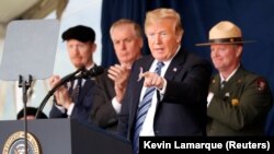 U.S. President Donald Trump acknowledges a guest while taking part in the 17th annual September 11 observance at the Flight 93 National Memorial near Shanksville, Pennsylvania.