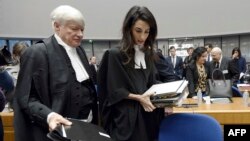 France -- Lawyers representing Armenia, Amal Clooney (R) and Geoffrey Robertson, arrive for the start of the appeal hearing in Perincek case before the European Court of Human Rights in Strasbourg, January 28, 2015