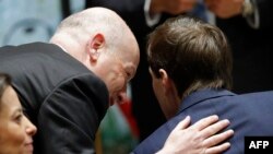 Jason Greenblatt (L), Trump's special representative for international negotiations, speaks to White House senior advisor Jared Kushner during a press conference in Jerusalem, May 22, 2017