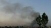 Smoke rises into the air after Taliban militants attacked the Afghan provincial capital, Ghazni.