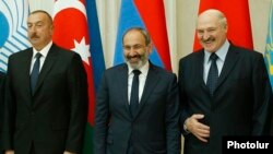 Russia - Armenian Prime Minister Nikol Pashinian and Presidents Alexander Lukashenko of Belarus and Ilham Aliyev of Azerbaijan pose for a photograph at a summit in Saint Petersburg, December 6, 2018.