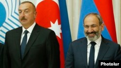 Russia - Armenian Prime Minister Nikol Pashinian and Azerbaijani President Ilham Aliyev pose for a photograph wih other ex-Soviet leaders at a summit in Saint Petersburg, December 6, 2018.