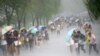 People hold umbrellas in heavy rain as Typhoon Soudelor approaches in China&#39;s Hangzhou, Zhejiang Province, on August 7. (Reuters)